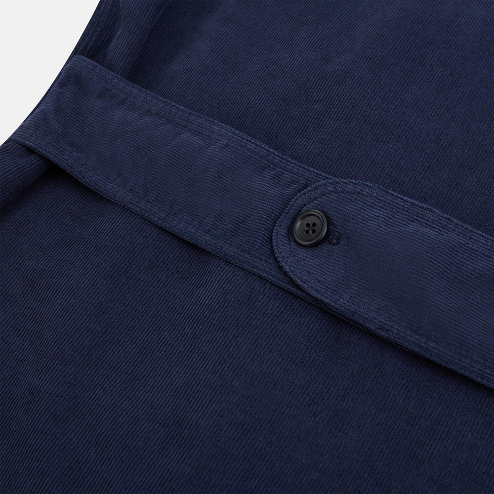 The Turnbull & Asser Light Navy Kingston Corduroy Caban Jacket features a double-breasted stretch cotton corduroy design with black buttons, notched collar, and long buttoned cuffs, displayed on a plain white background.