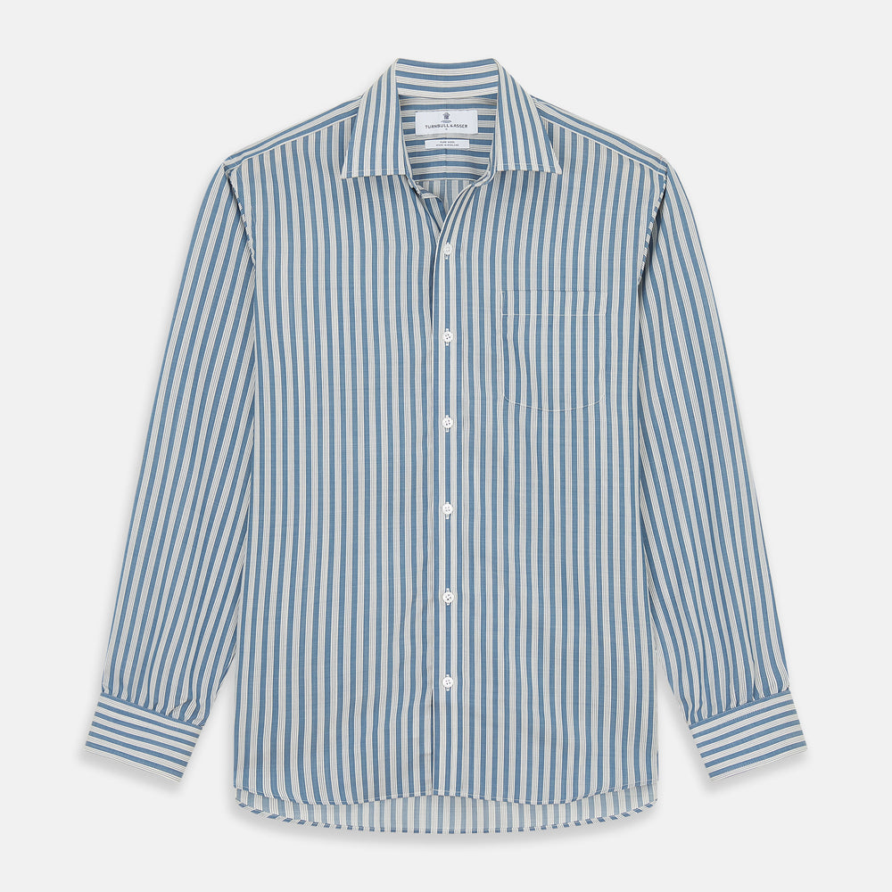 Turnbull & Asser’s Pale Blue Multi Stripe Weekend Fit Wool Shirt features a Derby collar, 1-button cuffs, and a chest pocket—ideal for casual layering. Shown laid flat on a white background for easy styling.