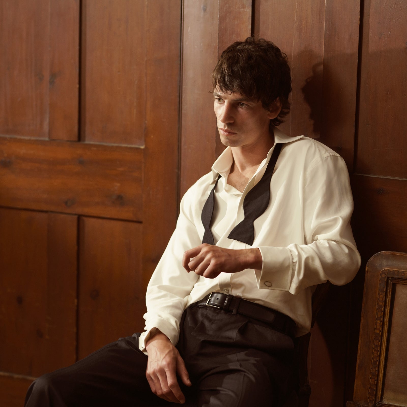 View 2 of product The Cream Silk Shirt by Turnbull & Asser features a T&A collar and 3-button cuffs, displayed folded on a light background—perfect for sophisticated evening wear.