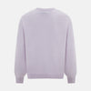 View 3 of product The Turnbull & Asser Lilac Cashmere Round Neck Jumper for men features long sleeves with ribbed cuffs and hem, offering a stylish, refined look. Shown against a white background.