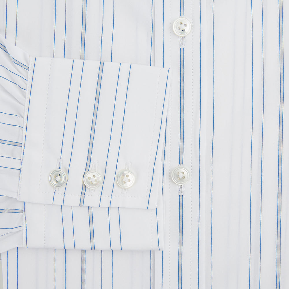 The Turnbull & Asser Pale Blue Multi Stripe Mayfair Shirt, featuring long sleeves, a classic collar, and buttoned cuffs, exemplifies British craftsmanship and is shown flat on a white background for a crisp look.