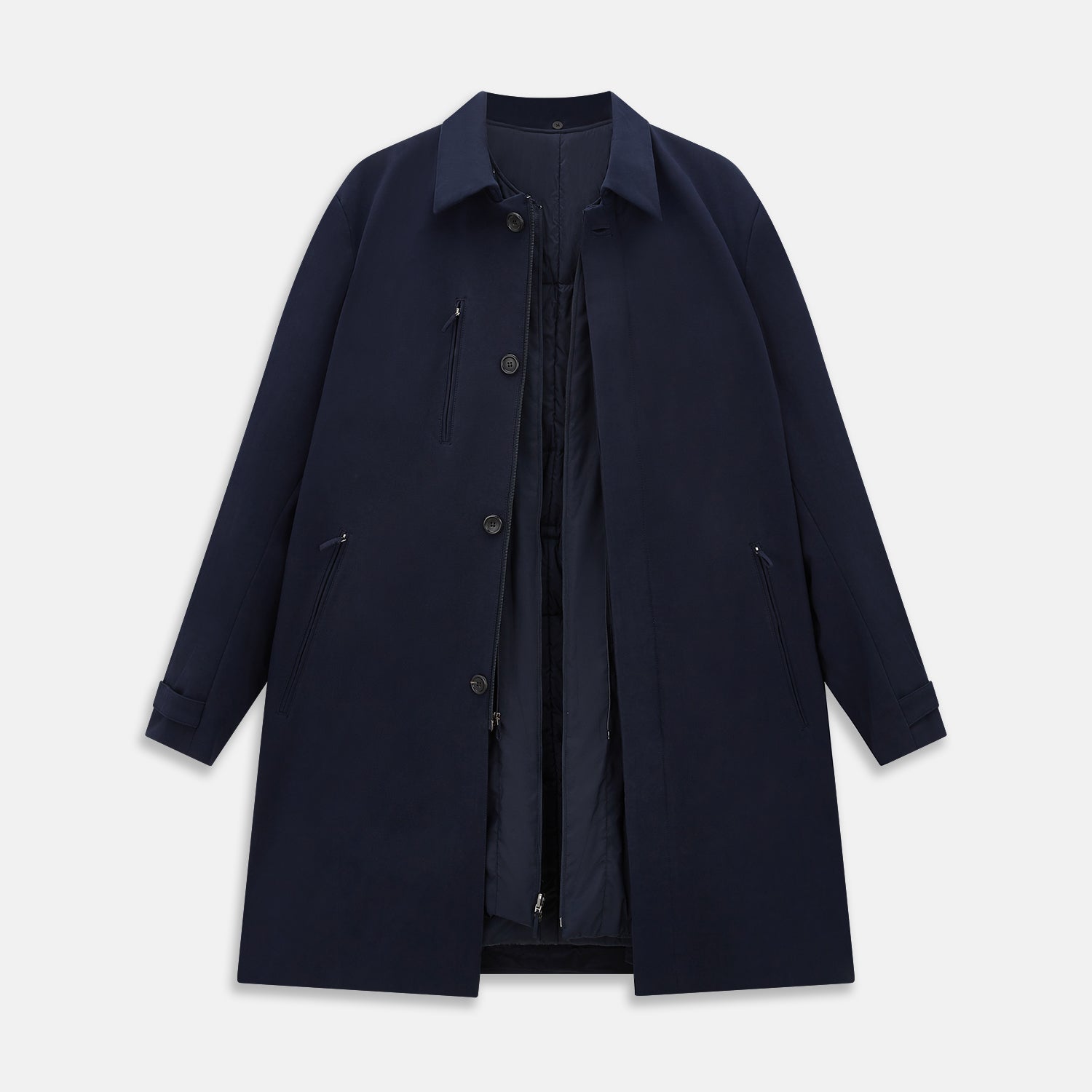 View 4 of product A Navy John Arthur Trench Coat by Turnbull & Asser, featuring a collar, button closure, adjustable cuff straps, two slanted front pockets, and a chest zip pocket, is displayed flat on a white background.
