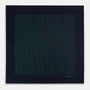 View 4 of product The Turnbull & Asser Navy and Hunter Green Stripe Silk Pocket Square features thin green stripes, hand-rolled edges, and "TURNBULL & ASSER HAND PRINTED IN ENGLAND" in green on the bottom right corner.