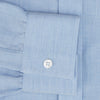 View 3 of product The Turnbull & Asser Pale Blue Cotton Cashmere Dorset Collar Richmond Shirt features long sleeves, a button-down collar, white buttons, and a chest pocket. It is neatly displayed flat on a white background.