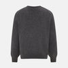 View 3 of product The Charcoal Grey Cashmere V-neck Jumper by Turnbull & Asser features ribbed cuffs, hem, and neckline—an essential knitwear piece, shown on a white background.