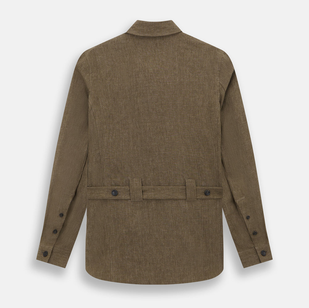 The Pine Cone Linen Holland Shacket by Turnbull & Asser is a brown men's lightweight outerwear piece with a collar, long sleeves, three front zip pockets, and black buttons, shown on a white background.