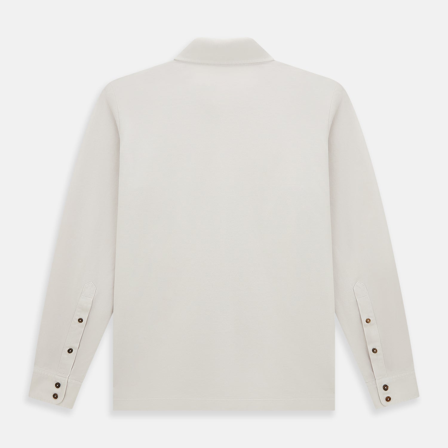 View 3 of product A pale pink luxury cotton rugby polo shirt by Turnbull & Asser, featuring long sleeves and a collar with no buttons, displayed flat on a white background.