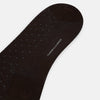 View 3 of product A single Turnbull & Asser Dark Chocolate/Blue Pale Dot Mid-Length Sock is displayed upright against a plain white background.