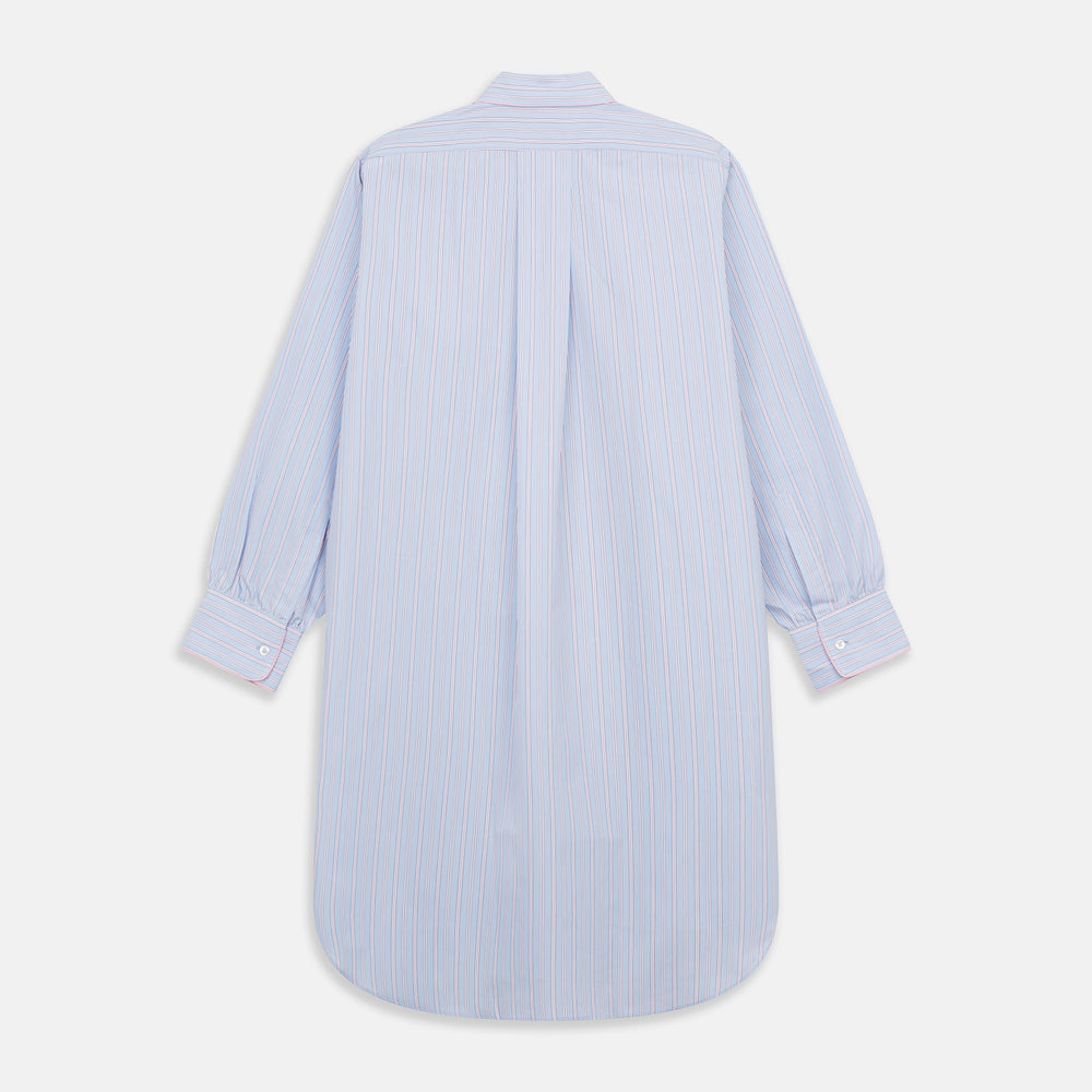 The Blue and Pink Stripe Poplin Cotton Nightshirt by Turnbull & Asser features long sleeves, a collar, front buttons, chest pocket, rounded hem, and light blue fabric with white, pink, and yellow vertical stripes.
