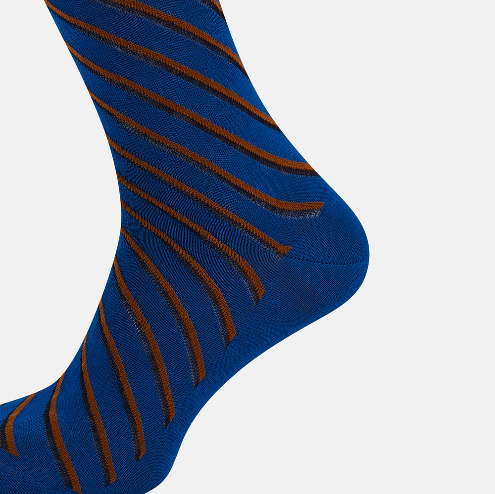 A single Turnbull & Asser Royal Blue/orange Diagonal Striped Long Sock is shown in a knee-high style against a plain light gray background.