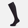View 1 of product A single navy long sock by Turnbull & Asser, featuring a subtle ribbed texture and crafted from soft Egyptian cotton, displayed on a plain white background.
