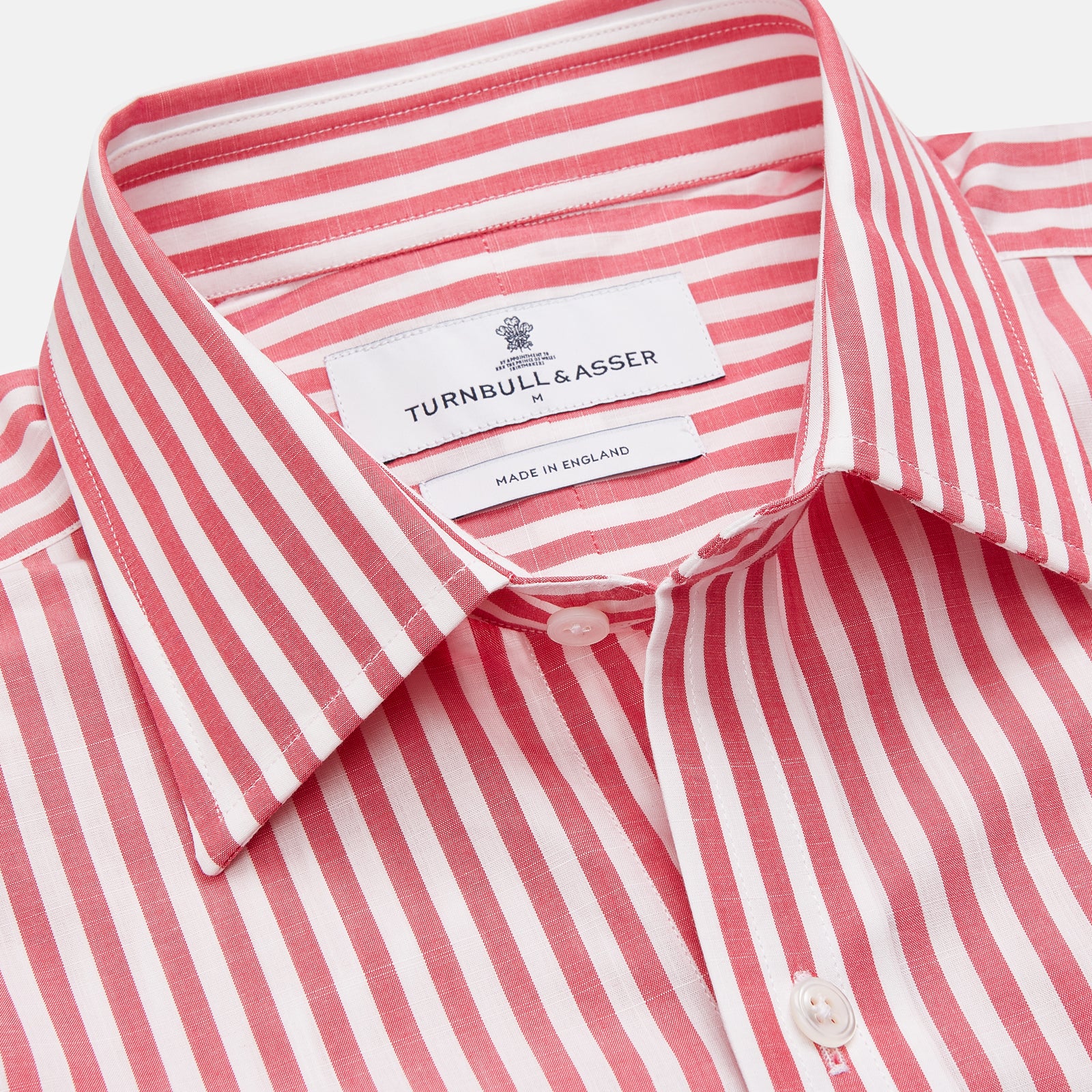 View 2 of product The Pink Candy Stripe Cotton Weekend Fit Finch Shirt by Turnbull & Asser features vertical red and white stripes, a left chest pocket, and a classic collar—an essential men’s wardrobe staple shown against a white backdrop.