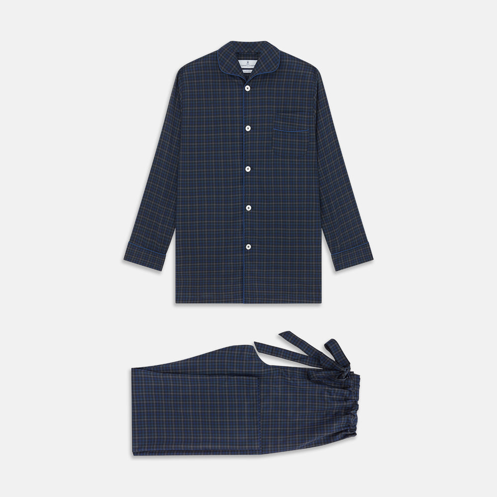 The Turnbull & Asser Blue Multi Check Wool Quin Pyjama Set features a long-sleeve button-up top with chest pocket and drawstring pants, both displayed flat on white—a luxurious choice for refined sleepwear.