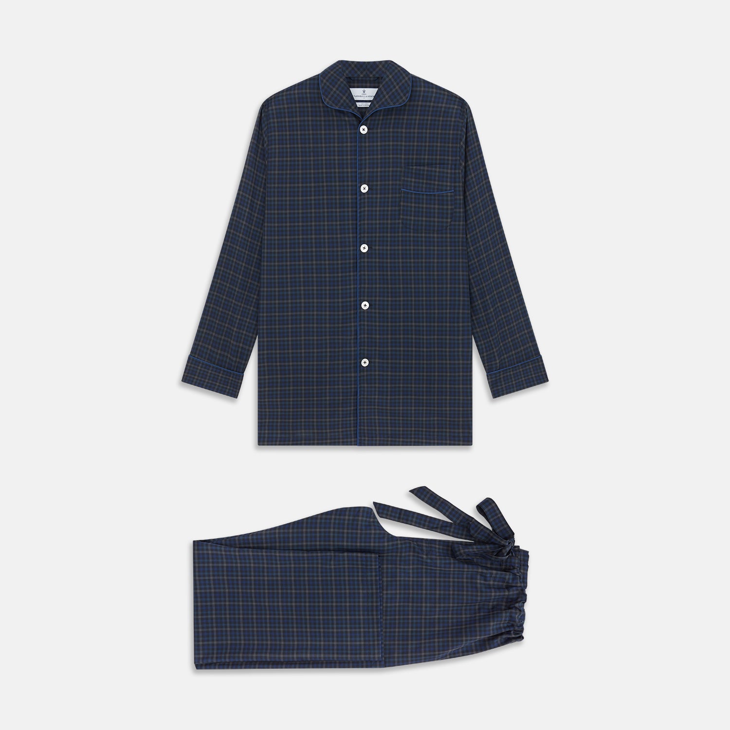 View 1 of product The Turnbull & Asser Blue Multi Check Wool Quin Pyjama Set features a long-sleeve button-up top with chest pocket and drawstring pants, both displayed flat on white—a luxurious choice for refined sleepwear.