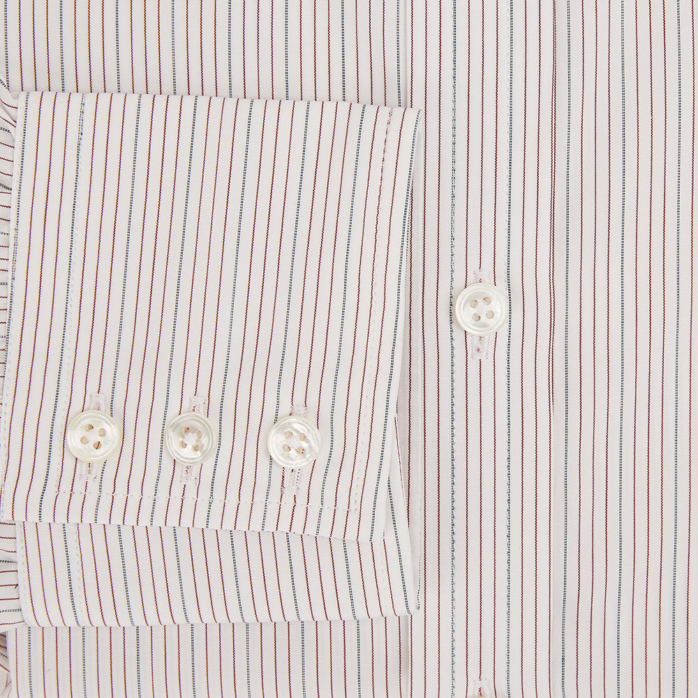 The Turnbull & Asser Burgundy Multi Hairline Stripe Mayfair Shirt features long sleeves, a classic collar, buttoned cuffs, and slim vertical stripes—ideal for formal wear and shown against a plain white background.