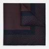 View 1 of product The Turnbull & Asser Navy and Orange Dot Silk Pocket Square features exquisite handmade craftsmanship.