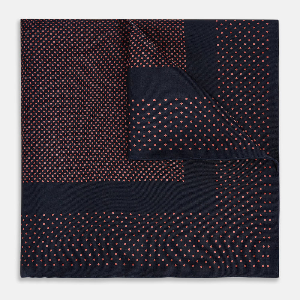 The Turnbull & Asser Navy and Orange Dot Silk Pocket Square features exquisite handmade craftsmanship.