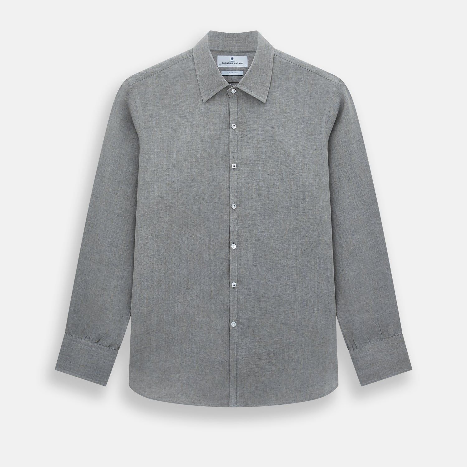 View 1 of product The Grey Linen Westminster Shirt by Turnbull & Asser is a long-sleeve, light gray button-up with a formal collar and white buttons, highlighting British craftsmanship and laid flat on a white background.