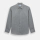 The Grey Linen Westminster Shirt by Turnbull & Asser is a long-sleeve, light gray button-up with a formal collar and white buttons, highlighting British craftsmanship and laid flat on a white background.