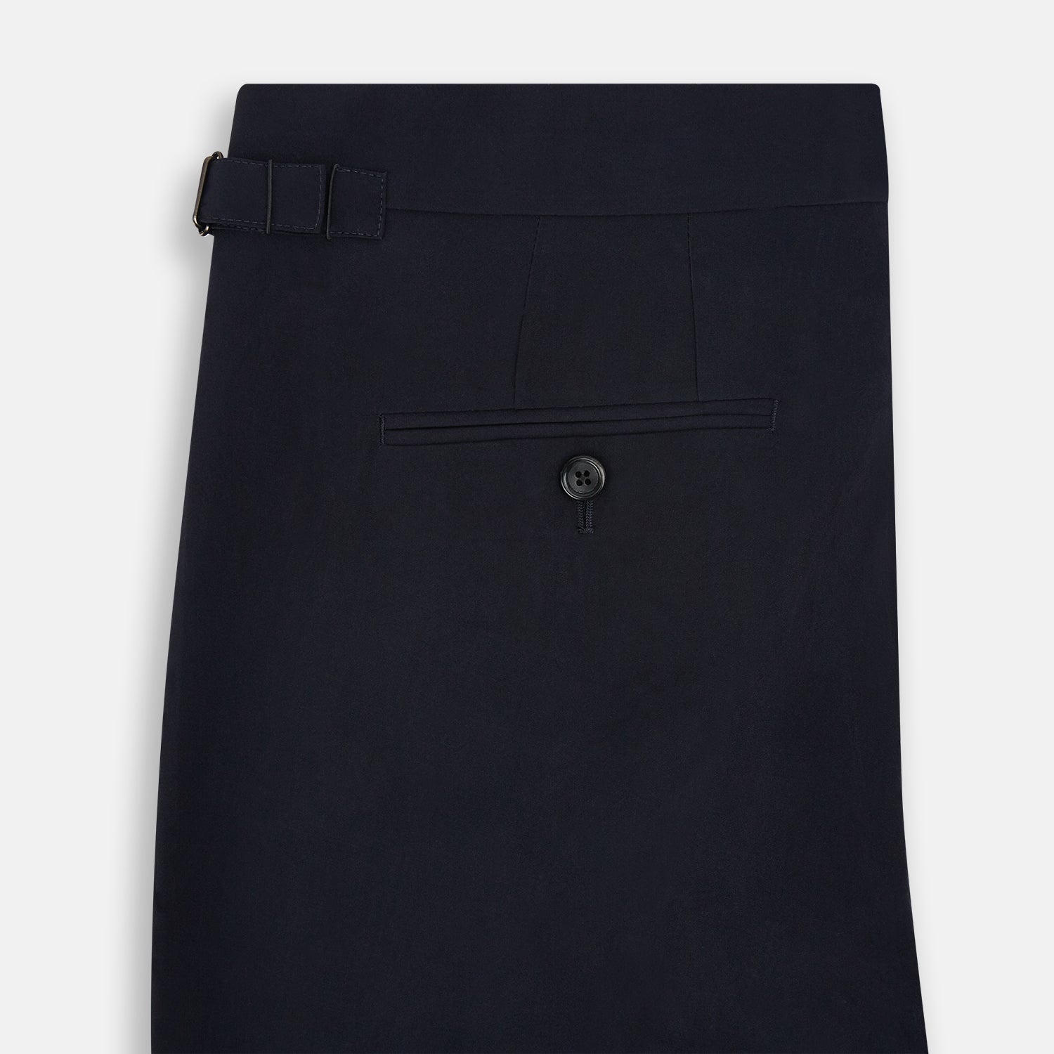 View 5 of product A pair of Midnight Blue Wool Henry Trousers by Turnbull & Asser, with a button closure and straight legs, shown against a plain white background.