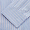 View 3 of product The Turnbull & Asser Blue Multi Stripe Cotton Regular Fit Whitby Shirt features white vertical stripes, long sleeves, button-down front, pointed collar, and buttoned cuffs, shown laid flat on a white background.