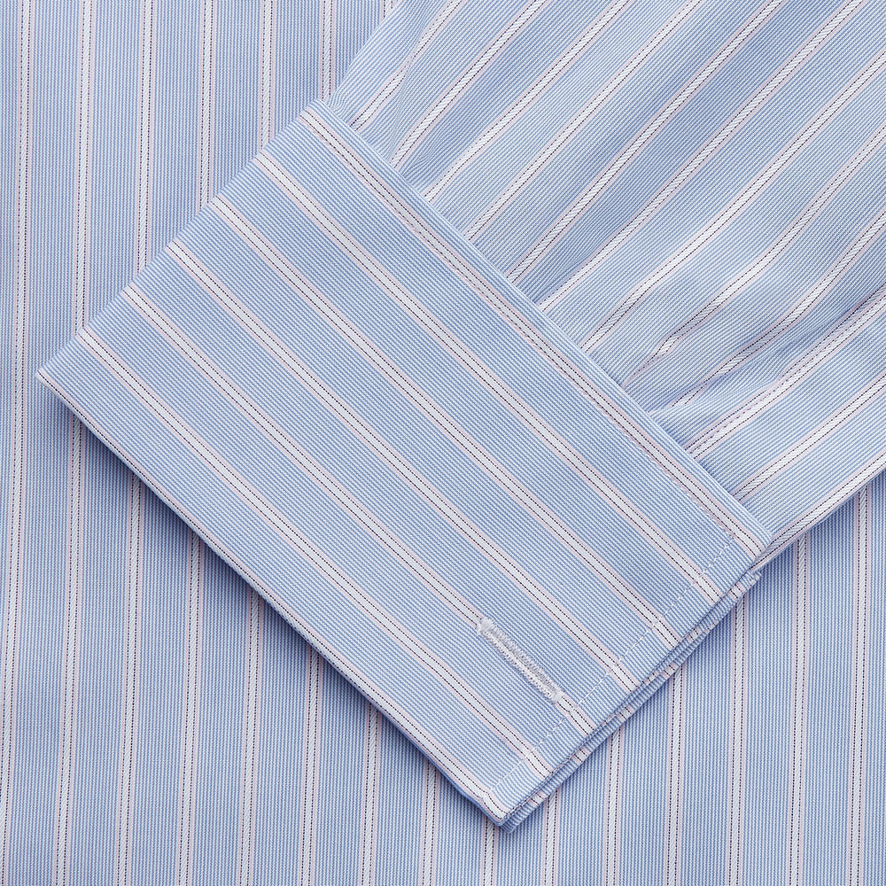 The Turnbull & Asser Blue Multi Stripe Cotton Regular Fit Whitby Shirt features white vertical stripes, long sleeves, button-down front, pointed collar, and buttoned cuffs, shown laid flat on a white background.