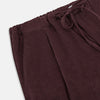 View 2 of product Turnbull & Asser Burgundy Corduroy Miles Trousers: high-waisted, straight-leg pants with an elasticated drawstring waist, shown on a white background.
