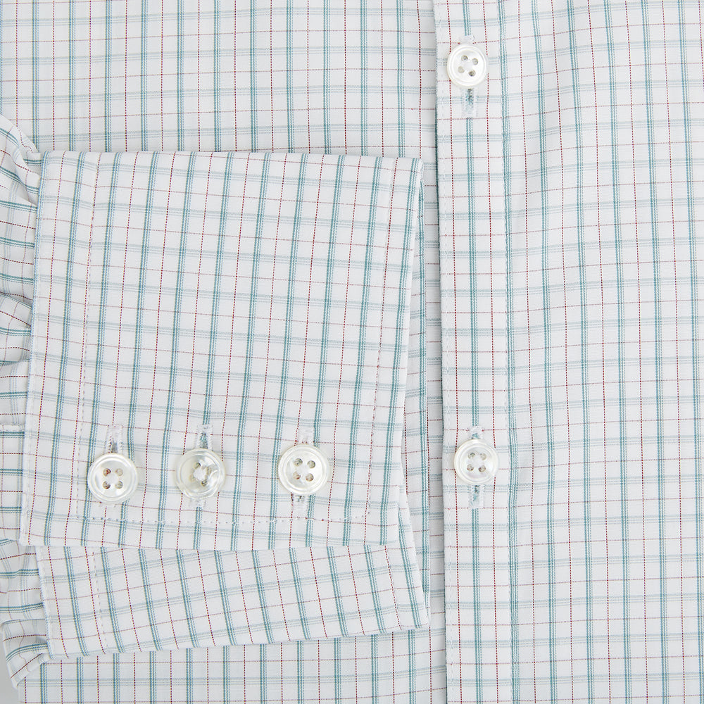 The Turnbull & Asser Turquoise and Red Multi Check Westminster shirt features long sleeves, a standard collar, and buttoned cuffs, showcasing fine British craftsmanship. It’s pictured laid flat on a white background.