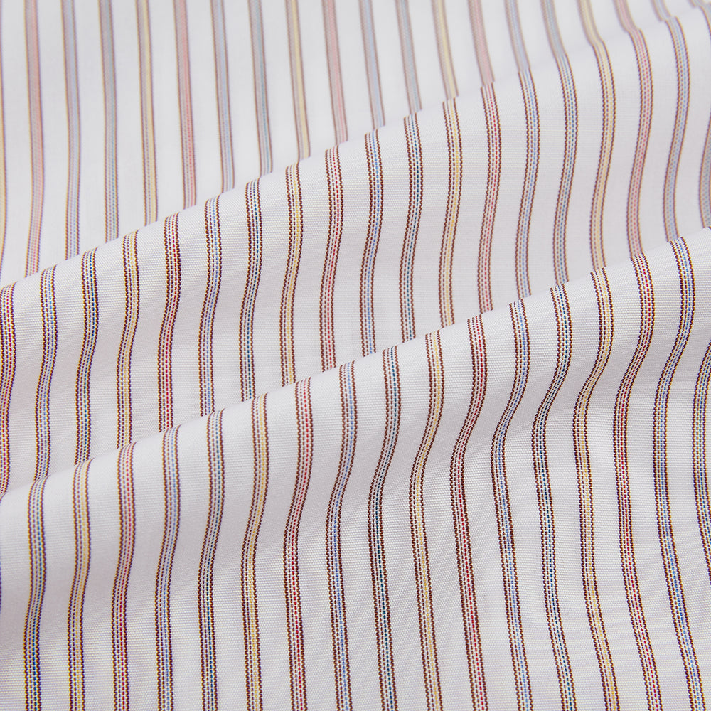 The Red with Multicoloured Music Stripe Mayfair Shirt by Turnbull & Asser is a long-sleeve, button-up shirt with a collar, featuring vibrant multicoloured stripes, inspired by classic British design, neatly laid flat on a plain background.