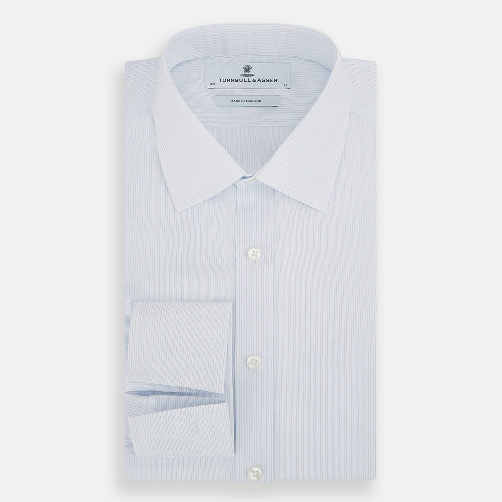 The Turnbull & Asser Blue and White Thin Stripe Shirt features a T&A collar and double cuffs, shown against a plain white background.