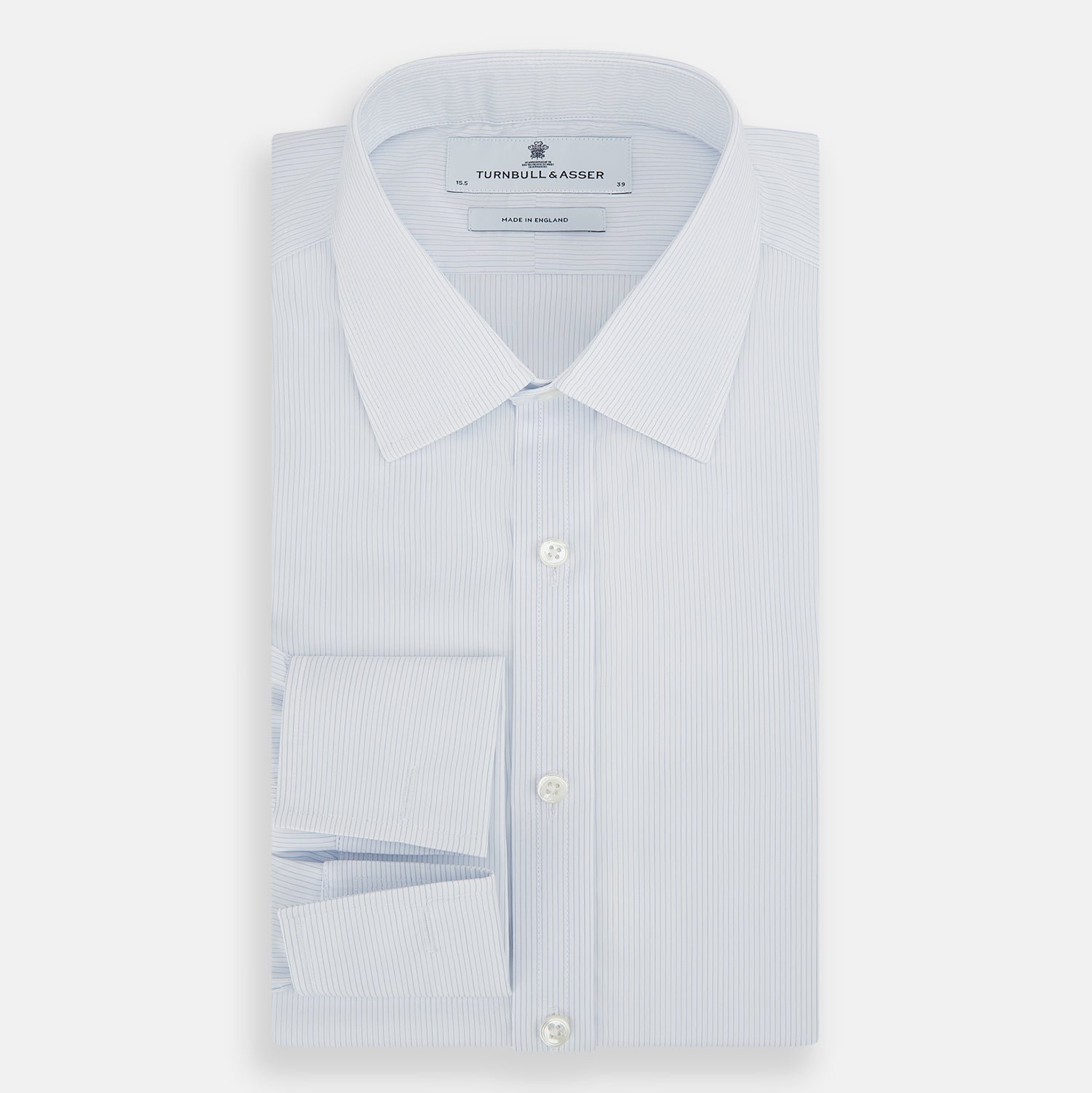 View 5 of product The Turnbull & Asser Blue and White Thin Stripe Shirt features a T&A collar and double cuffs, shown against a plain white background.