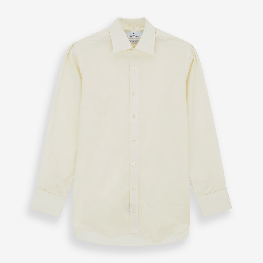 The Turnbull & Asser Tomorrow Never Dies Cream Cotton Hamburg Shirt, as seen on James Bond, features a long sleeve, button-down front, and collar. It's laid flat on a white background.