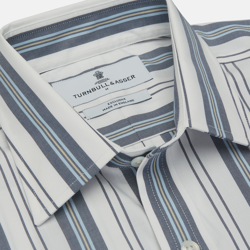 The Turnbull & Asser Blue, Green & White Stripe Weekend Fit Shirt features a Derby collar, 1-button cuffs, and a classic striped design—ideal for winter layering. Displayed on a plain white background.