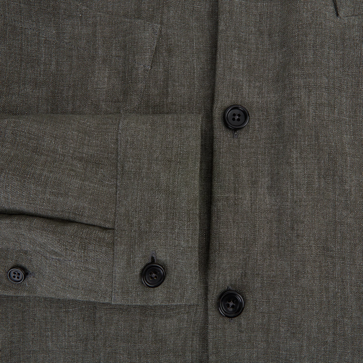 View 4 of product The Olive Linen Holland Shacket by Turnbull & Asser is a lightweight olive button-up jacket in Irish linen with a collar, two front pockets, one chest pocket, and slanted hem pockets—ideal outerwear shown on a plain white background.