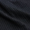 View 8 of product The Navy Tailored Pinstriped Shirt Jacket by Turnbull & Asser is a smart-casual, lightweight cotton-linen piece with long sleeves, a collar, left chest pocket, and front buttons for easy style.