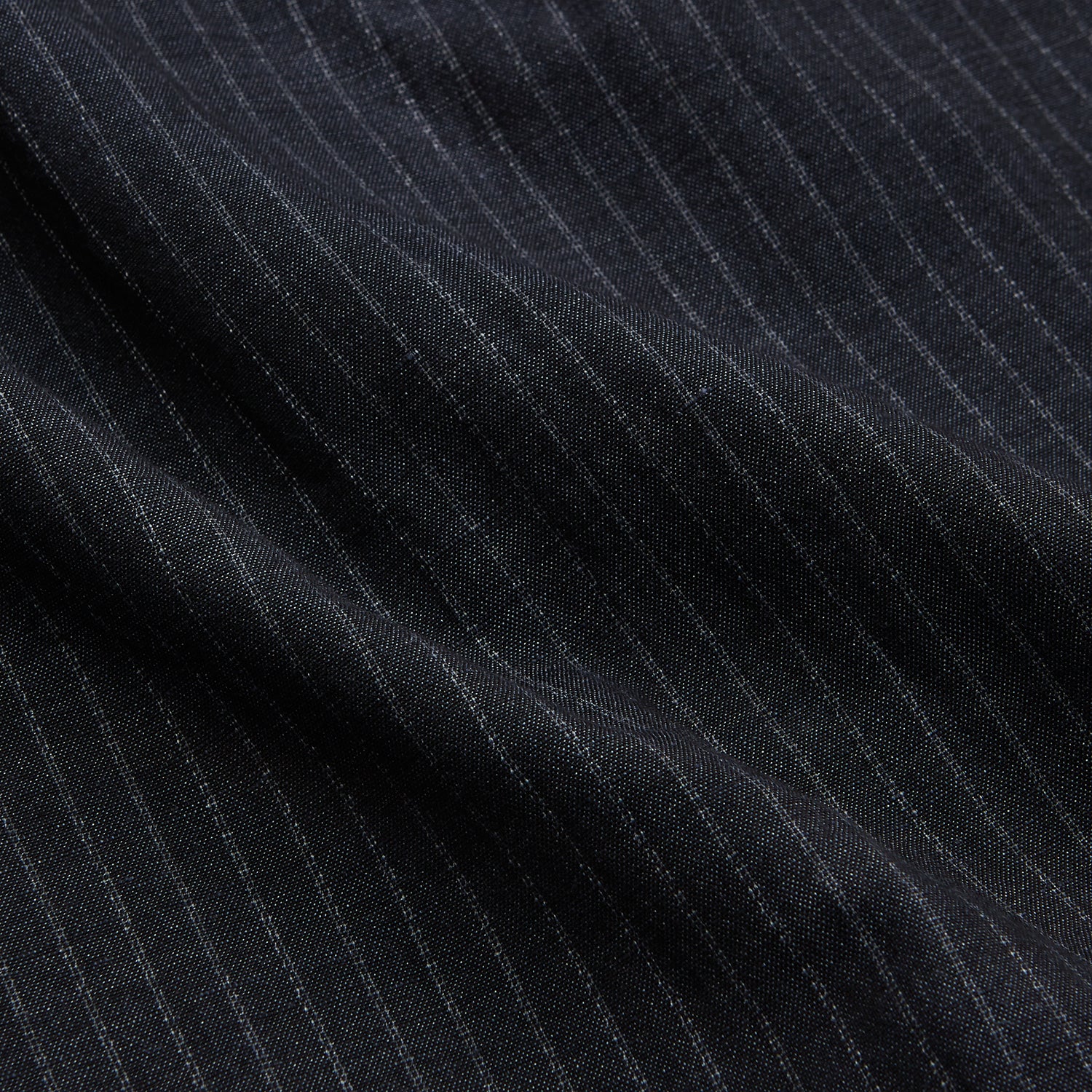 View 8 of product The Navy Tailored Pinstriped Shirt Jacket by Turnbull & Asser is a smart-casual, lightweight cotton-linen piece with long sleeves, a collar, left chest pocket, and front buttons for easy style.