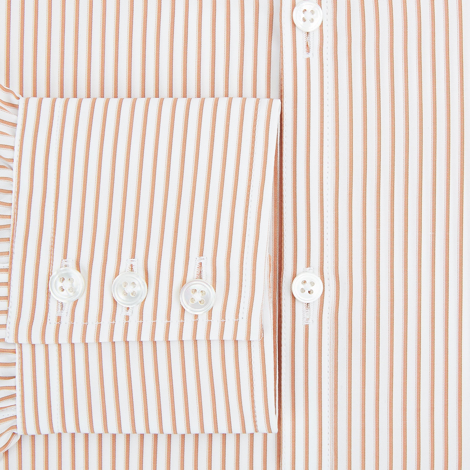 View 4 of product The Orange Multi Stripe Westminster Shirt by Turnbull & Asser features thin vertical orange and white stripes, a Turnbull collar, and long sleeves, elegantly displayed flat against a white background.