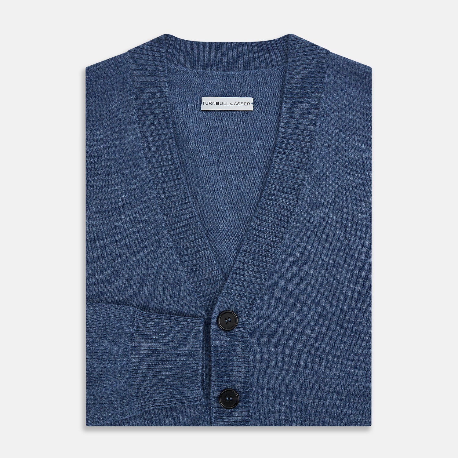 View 4 of product Turnbull & Asser Blue Cashmere Cardigan in soft knit, with black buttons, ribbed cuffs and hem, and two front pockets in vibrant colours—shown on a plain white background.