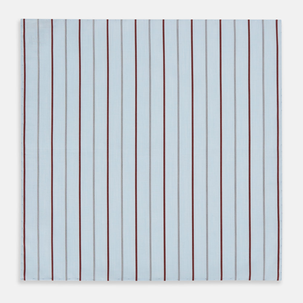 The Turnbull & Asser Burgundy Wide Pinstripe Hand-Rolled Handkerchief features bold burgundy stripes with hand-rolled edges, displayed flat on a white background for an elegant look.