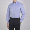 View 4 of product The Turnbull & Asser Blue Royal Oxford Cotton Shirt features a button-down collar, 3-button cuffs, and a visible brand label, shown neatly folded on a white background—ideal for pairing with a navy suit.