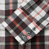 View 3 of product The Turnbull & Asser Black Multi-check Linen Blend Regular Fit Mayfair Shirt features long sleeves, a classic T&A collar and cuffs, and a black-and-red check pattern, shown on a white background.