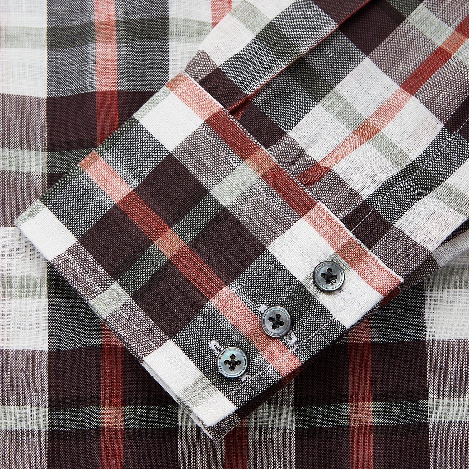 View 3 of product The Turnbull & Asser Black Multi-check Linen Blend Regular Fit Mayfair Shirt features long sleeves, a classic T&A collar and cuffs, and a black-and-red check pattern, shown on a white background.
