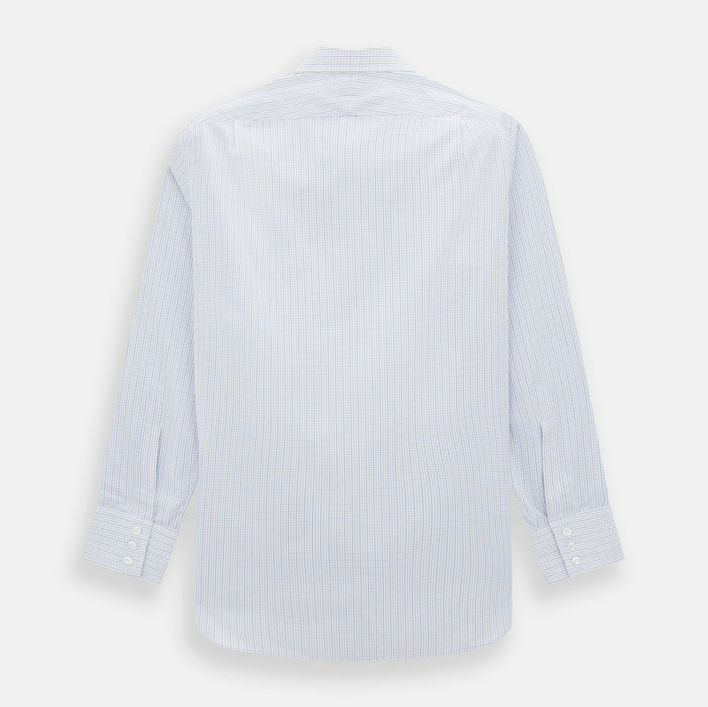 The Turnbull & Asser Pale Blue and Navy Grid Check Mayfair Shirt is a long-sleeve, button-up shirt made from fine Italian cotton, featuring a pointed collar and buttoned cuffs, shown against a plain white background.