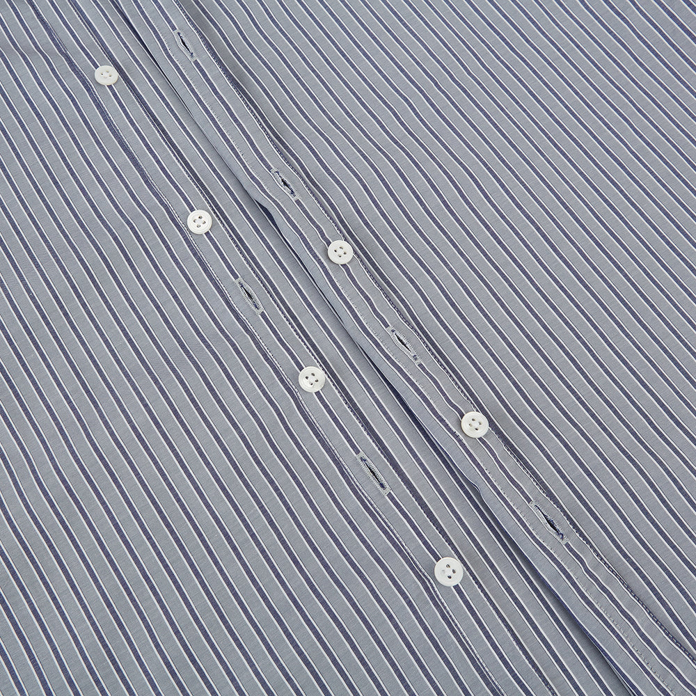 The Turnbull & Asser Grey Ticking Stripe Westminster Shirt features thin vertical grey stripes and a classic collar, showcased against a plain white background.