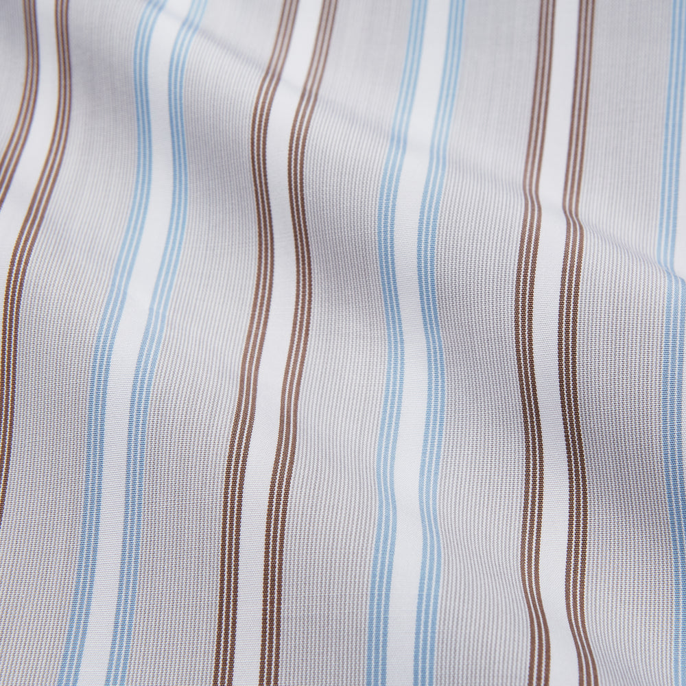 Turnbull & Asser's Beige Multi Stripe Cotton Regular Fit Penrose Shirt features blue, beige, and white vertical stripes with a crisp white collar and cuffs. Displayed on a plain background.