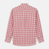 View 6 of product The Turnbull & Asser Red Check Cotton Weekend Fit Finch Shirt is a men's long-sleeved, button-up shirt with a Derby collar and red-and-white plaid pattern, displayed flat on a white background.