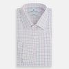 View 5 of product The Turnbull & Asser Pink Overlay Grid Check Mayfair Shirt is a long-sleeved, button-up with a collar and buttoned cuffs, featuring a white base and thin pink grid lines. Laid flat against a white surface.
