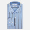 View 5 of product The Sky Blue Track Stripe Westminster Shirt by Turnbull & Asser features long sleeves, a Turnbull collar, and vertical dark blue and white stripes, displayed flat on a white surface.