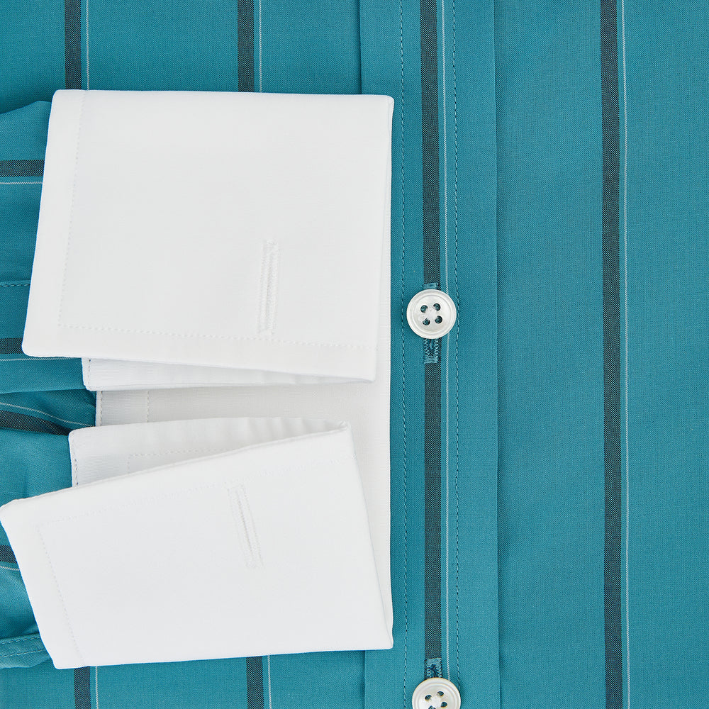 The Turnbull & Asser Turquoise Track Stripe Shirt features a Mayfair fit, contrast white T&A collar and double cuffs, black vertical stripes, and long sleeves, displayed flat on a light background.