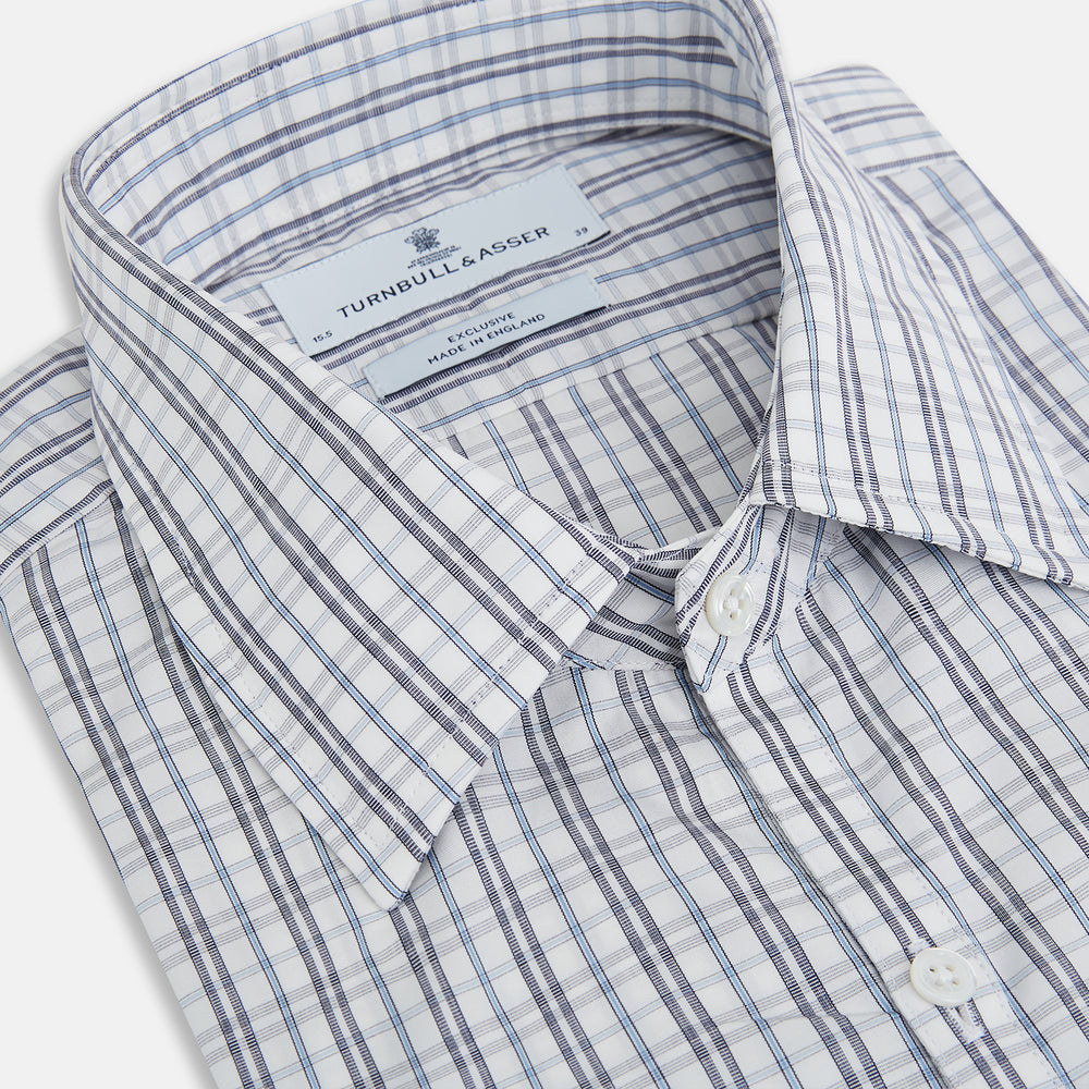 The Turnbull & Asser Navy and Blue Multi Tattersall Westminster Shirt features long sleeves, a button-down style, and a Turnbull collar in a blue and gray check pattern on white, laid flat against a white background.